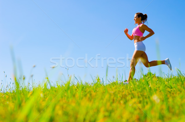 Athletic Woman Exercising  Stock photo © cardmaverick2