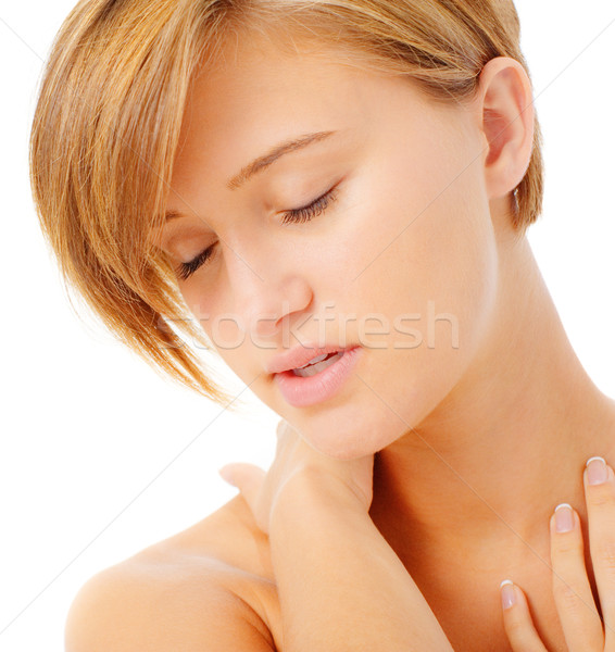 Woman Massaging Herself Stock photo © cardmaverick2