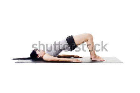Cinese donna yoga stuoia di yoga ponte posa Foto d'archivio © cardmaverick2