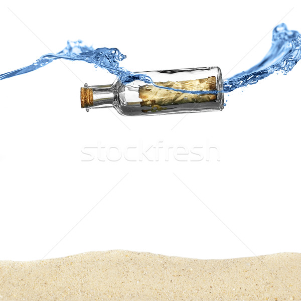 Nachricht Flasche schwimmend Ozean über Sand Stock foto © cardmaverick2