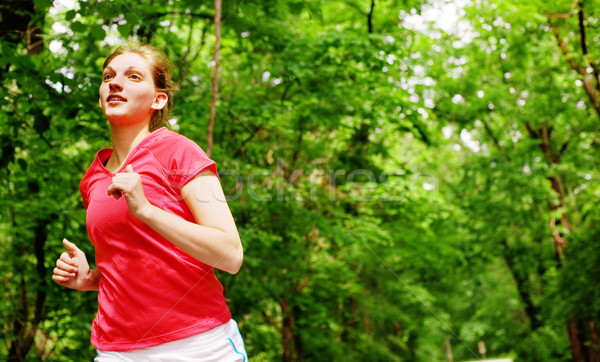 Woman In Red Running Stock photo © cardmaverick2