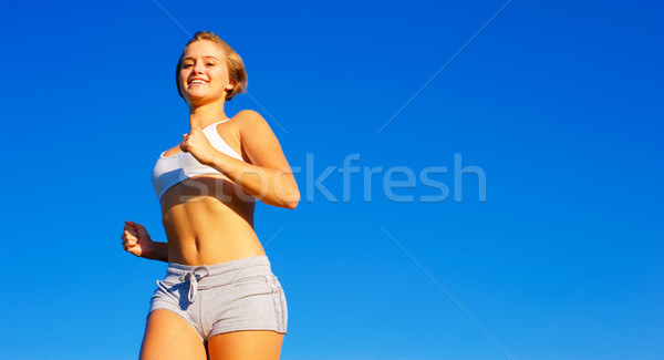 Stock photo: Fit Young Woman Working Out