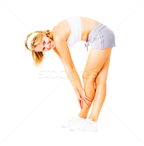 Stock photo: Young Woman Working Out On White