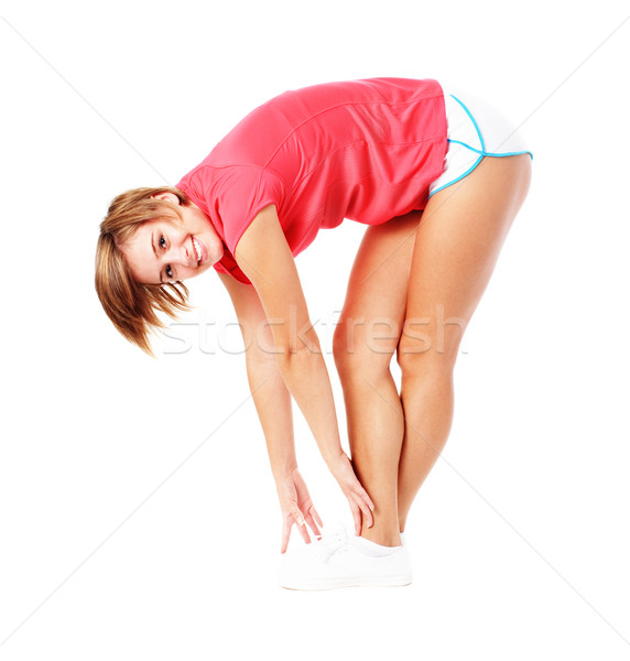 Jungen Fitness Frau rot Shirt Dehnung isoliert Stock foto © cardmaverick2