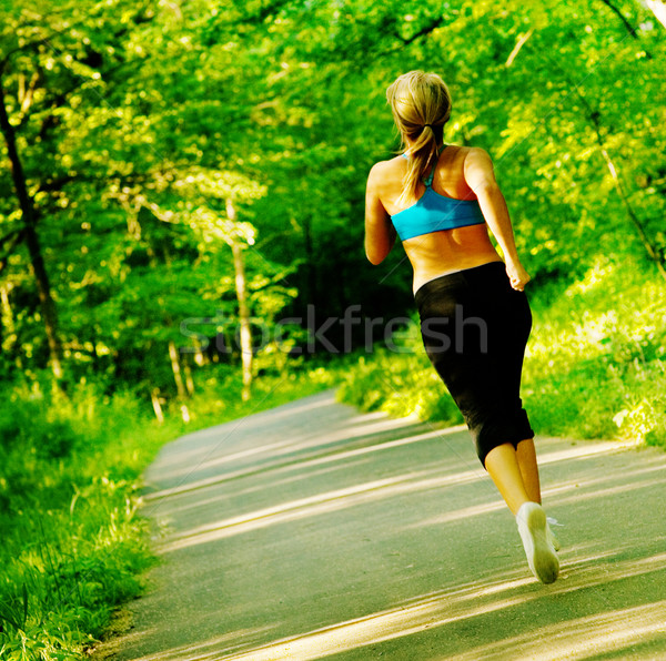 Fiatal nő edz erdő út sport természet Stock fotó © cardmaverick2