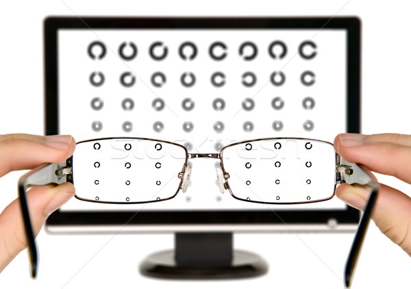 Man is viewing to eye examination chart Stock photo © carenas1