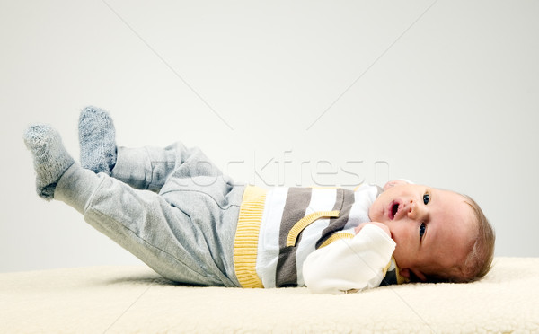 Güzel bebek erkek izlerken beyaz büyük gözleri Stok fotoğraf © carenas1