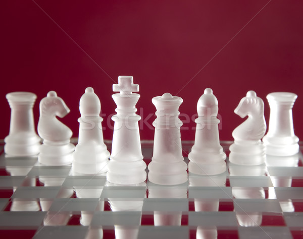 Chess game figures on red background Stock photo © carenas1