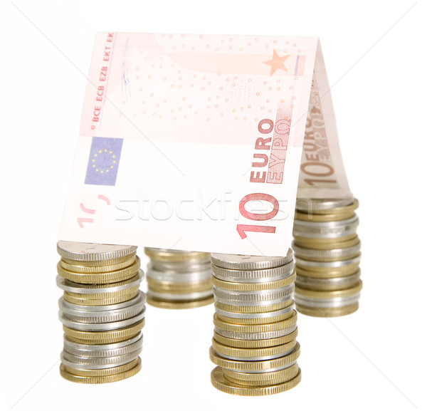 Money house made from cons and banknotes Stock photo © carenas1