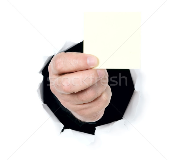 Man tonen lege kaart gat witte papier Stockfoto © carenas1