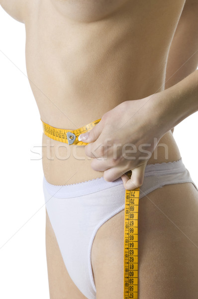 Fitnessz közelkép karcsú női test mér Stock fotó © carlodapino