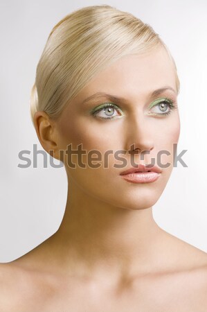 Portrait of pretty blonde woman she looks in to the lens Stock photo © carlodapino