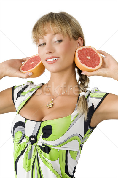 Nagy grapefruit szép fiatal nő zöld ruha Stock fotó © carlodapino