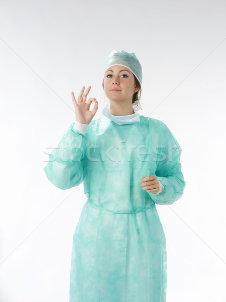Ok nővér operáció ruha elvesz munka Stock fotó © carlodapino