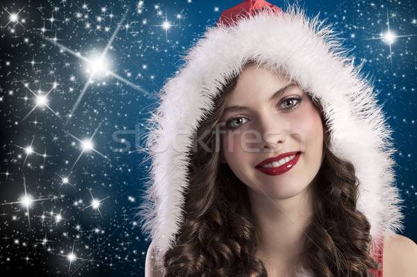 curly brunette with santa hood Stock photo © carlodapino
