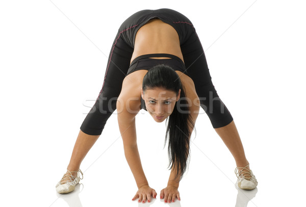 Stock photo: strecthing girl