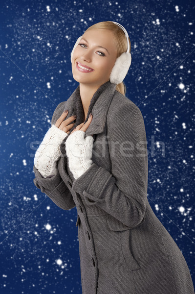 cute girl ready for the winter cold day posing and smiling Stock photo © carlodapino