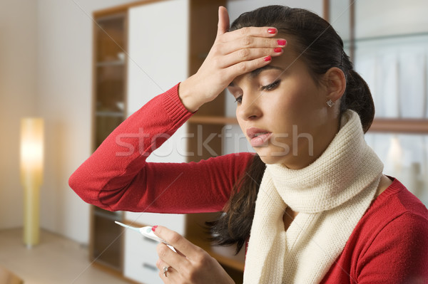 Lány megérint fej láz néz beteg Stock fotó © carlodapino
