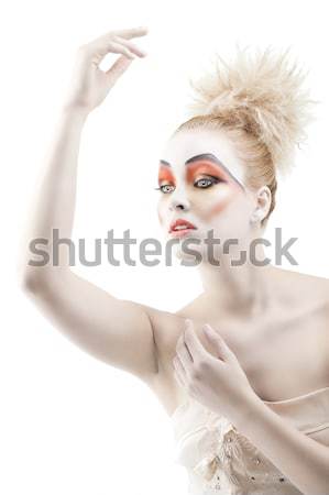 Stock photo: beautiful girl wearing only a feather boa and a mask