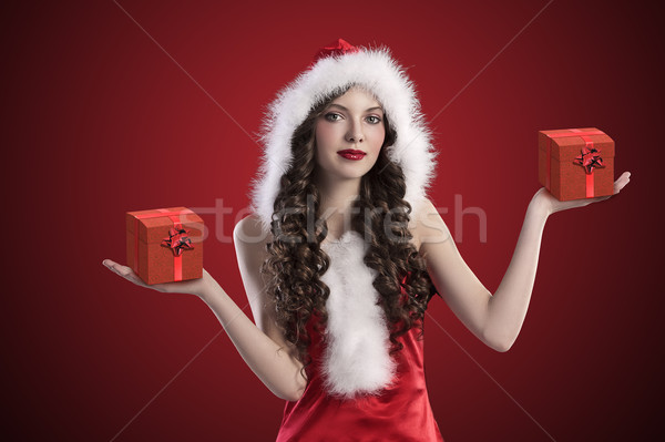 sweet santa brunette spreading her arms Stock photo © carlodapino