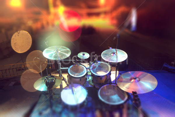Musical background.Drumkit on stage lights performance Stock photo © carloscastilla