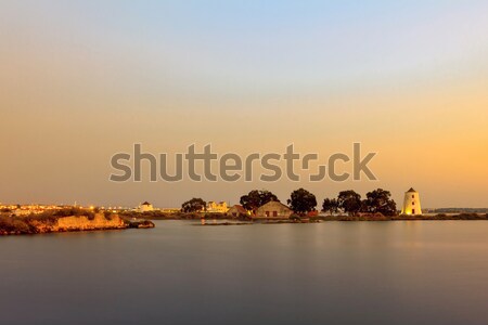 Marea puesta de sol río cielo agua sol Foto stock © Carpeira10