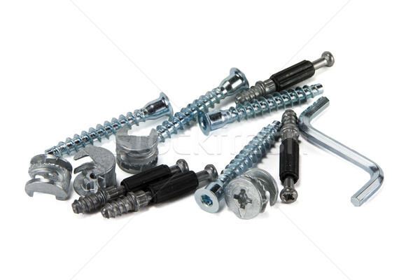 Stock photo: fittings for furniture, screws and mounts, isolated on white