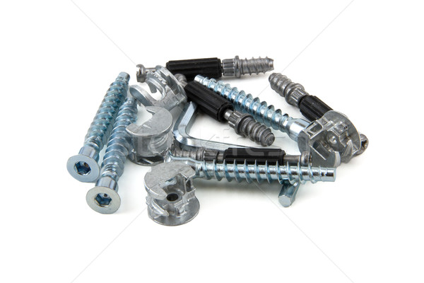 Stock photo: fittings for furniture, screws and mounts, isolated on white