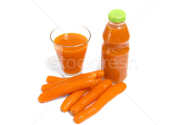 Carrots and juice in a glass and bottle Stock photo © Catuncia