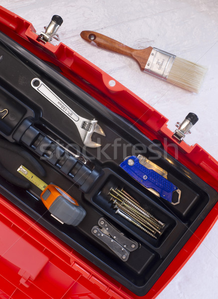 Orange Tool Box with Crescent Tape and Brush Stock photo © cboswell
