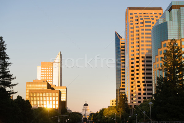 Sunset Reflects Off Buildings Downtown Sacramento California Cap Stock photo © cboswell