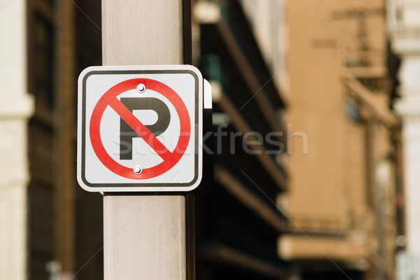 No Auto Parking Sign Bolted to Light Post Downtown  Stock photo © cboswell