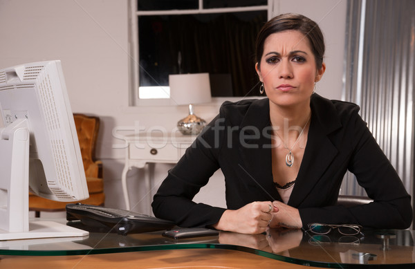 Office Worker Female Business Woman Slams Fist on Desk Stock photo © cboswell