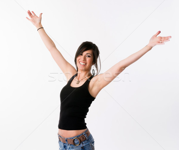 Pretty Brunette Woman Holds Arms Outstretched Jubilant Looking Up Stock photo © cboswell
