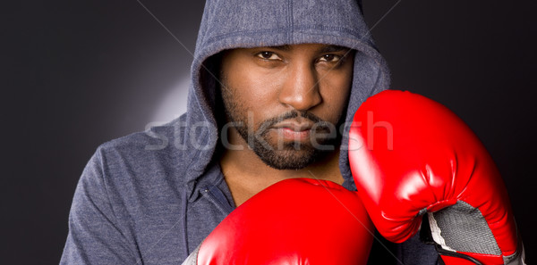 Férfi atléta boxoló vadászrepülő póz piros Stock fotó © cboswell