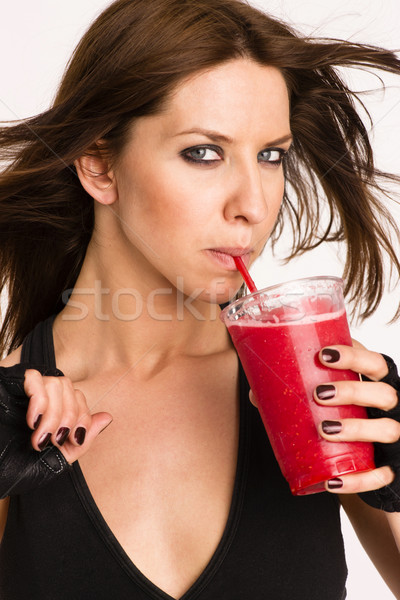 Attractive Athletic Female Expressing Positively Holds Frozen Fo Stock photo © cboswell