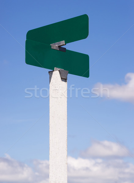 Blank Signs Crossraods Street Avenue Sign Blue Skies Clouds Stock photo © cboswell