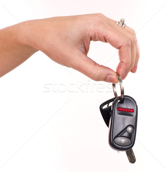Claves mano las llaves del coche mujer piel anillo Foto stock © cboswell