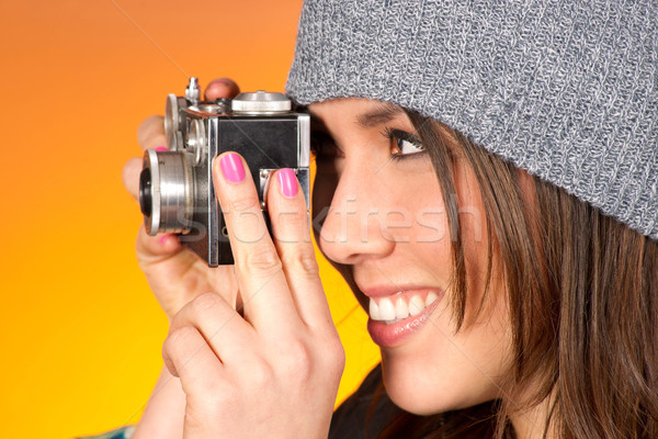 Hip Woman Snaps a Picture with Vintage Camera Stock photo © cboswell