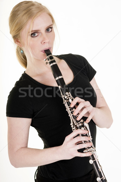 Pretty Blond Woman Playing Clarinet Musical Performance White Ba Stock photo © cboswell