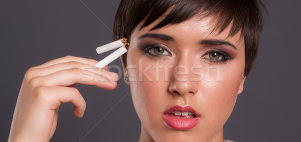 Young Teen Female Just 18 Breaks Cigarette Quits Smoking Stock photo © cboswell
