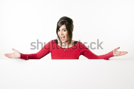 Female Presenter Stands Above Blank White Board Smiling Woman Stock photo © cboswell