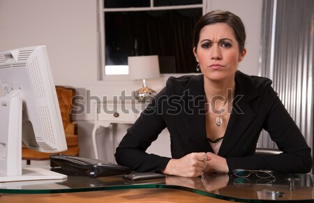 Business Woman in Adversarial Conversation Computer Desk Cell Ph Stock photo © cboswell