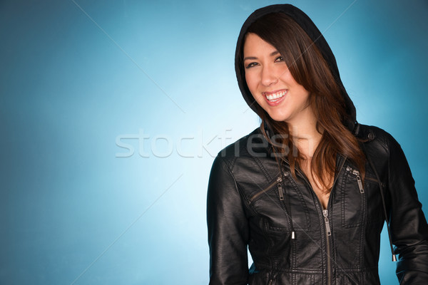 Hip Smiling Young Adult Woman Wearing Leather Jacket Hooded Swea Stock photo © cboswell