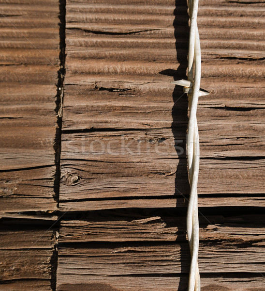 Single Barbed Wire Fence Strand Stapled Wood Fence Post Stock photo © cboswell