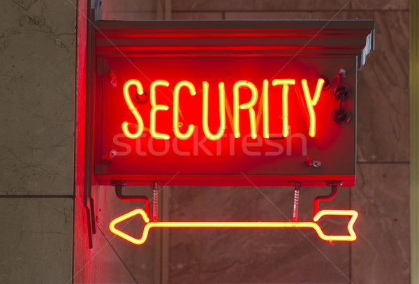 Kırmızı neon güvenlik imzalamak Stok fotoğraf © cboswell