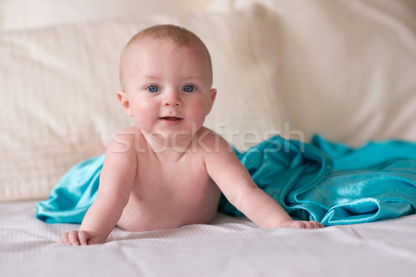 Fiatal kék csecsemő fiú fektet ágy Stock fotó © cboswell