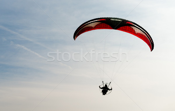 Una om care zboară Blue Sky persoană doua Imagine de stoc © cboswell
