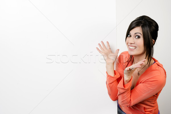 Female Presenter Stands Blank White Board Smiling Excited Woman Stock photo © cboswell