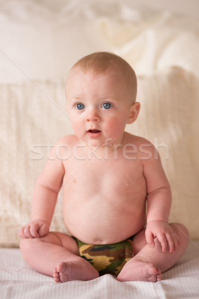 Young Blue Eyed Infant Boy Sitting Up Camo Underwear Stock photo © cboswell